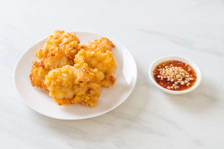 deep fried corn with sauce - vegan and vegetarian food styleの写真素材