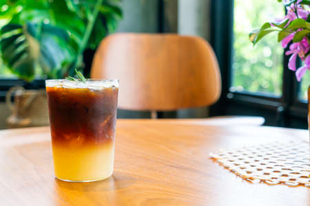 yuzu orange coffee glass in coffee shop cafe restaurantの写真素材
