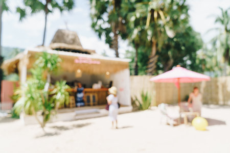 abstract blur coffee shop cafe and restaurant on beach for backgroundの写真素材
