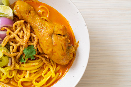 Northern Thai noodle curry soup with chicken (Kao Soi Kai) - Thai food styleの写真素材