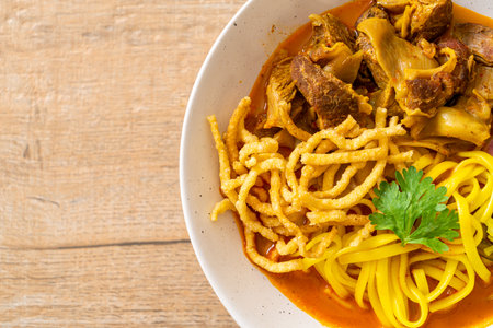 Northern Thai noodle curry soup with braised pork - Thai food styleの写真素材