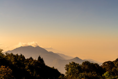 beautiful mountain layer with clouds and sunrise at Chiang Mai in Thailand