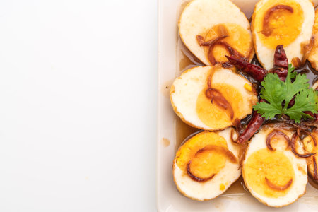 Fried Boiled Egg with Tamarind Sauce isolated on white backgroundの写真素材