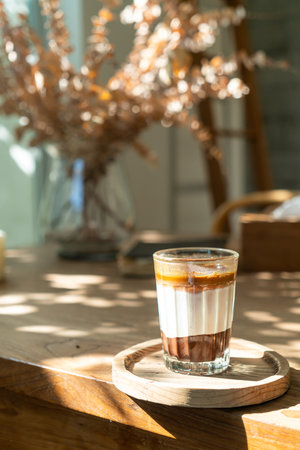 double dirty coffee cup (espresso coffee with milk and chocolate) in coffee shop cafeの写真素材