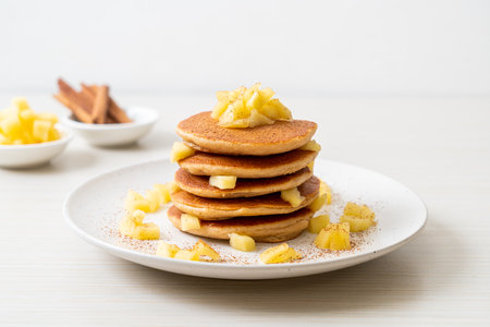 apple pancake or apple crepe with cinnamon powderの写真素材