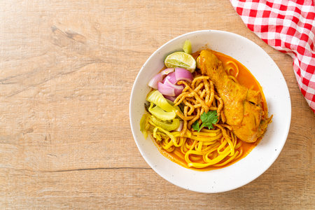 Northern Thai noodle curry soup with chicken (Kao Soi Kai) - Thai food styleの写真素材