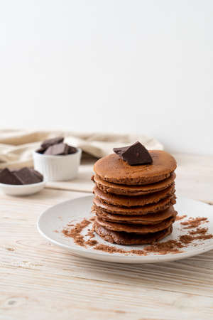 chocolate pancake stack with chocolate powderの写真素材
