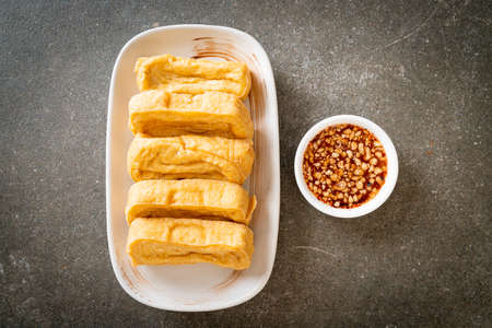 fried tofu with sauce - vegan and vegetarian food style