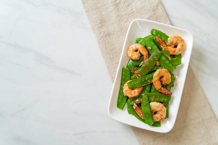 Stir-Fried Green Peas with Shrimp - Homemade food styleの写真素材