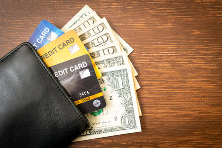 wallet with money and credit card - Economy and finance conceptの写真素材