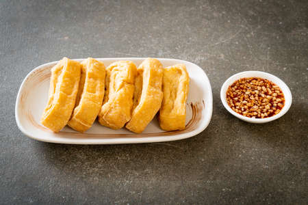 fried tofu with sauce - vegan and vegetarian food style