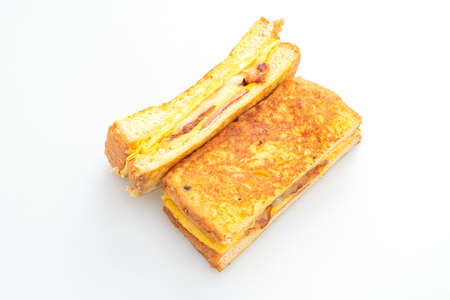 French toast ham bacon cheese sandwich with egg isolated on white background