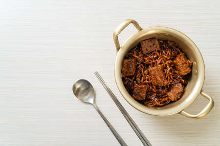 Jjapaguri or Chapaguri, Korean Black Beans Spicy Noodles with Beef - Korean food styleの写真素材