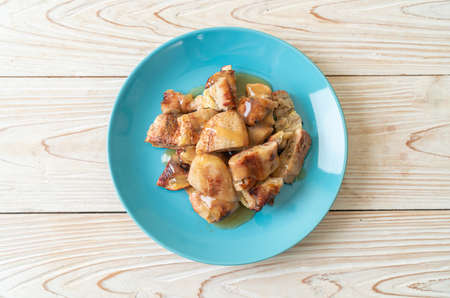 grilled bananas with coconut caramel sauce on plateの写真素材