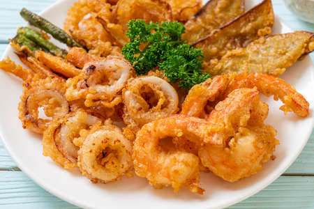 deep fried seafood (shrimps and squid) with mix vegetable - unhealthy food styleの写真素材