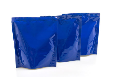 blue plastic bag for packaging isolated on white backgroundの写真素材