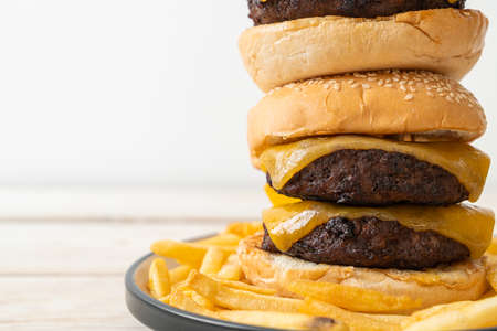 hamburger or beef burgers with cheese - unhealthy food styleの写真素材