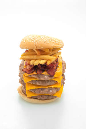 pork hamburger or pork burger with cheese, bacon and french fries isolated on white backgroundの写真素材