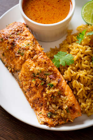 pan seared salmon tandoori with masala rice - muslim food styleの写真素材