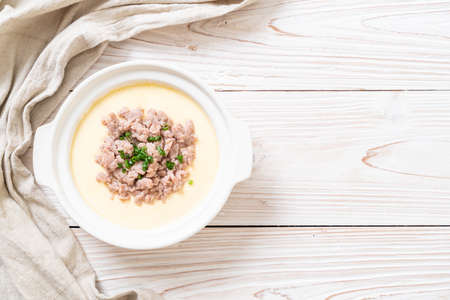homemade steamed egg with minced porkの写真素材