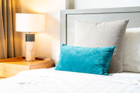 comfortable pillow decoration on bed in bedroomの写真素材