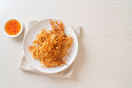 Fried Enoki Mushroom or Golden Needle Mushroom - vegan and vegetarian food styleの写真素材