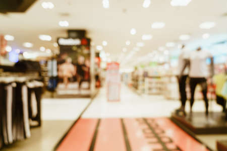 abstract blur shop and retail store in shopping mall for background