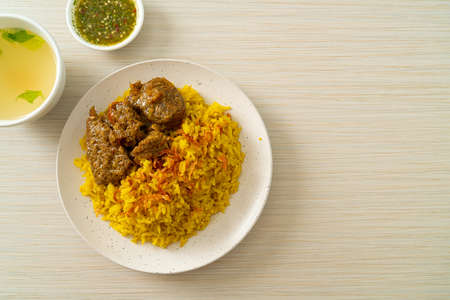 Beef Biryani or Curried rice and beef - Thai-Muslim version of Indian biryani, with fragrant yellow...