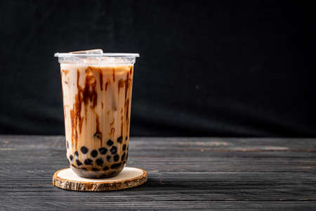 Taiwan milk tea with bubble on wood tableの写真素材