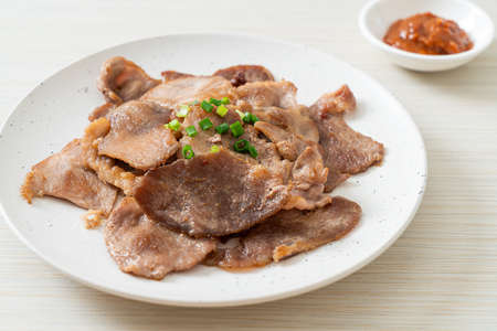grilled pork neck sliced on plate in Asian styleの写真素材