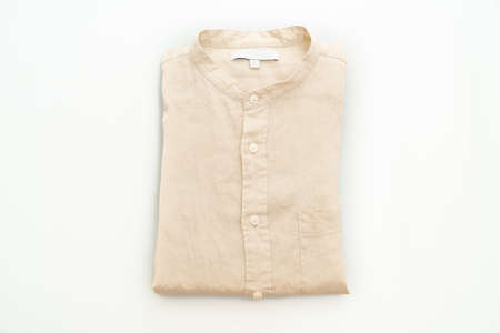 beige shirt fold isolated on white background