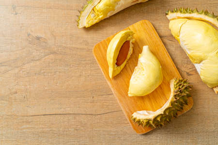 Durian riped and fresh ,durian peel on wooden boardの写真素材
