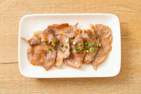 grilled pork neck sliced on plate in Asian styleの写真素材