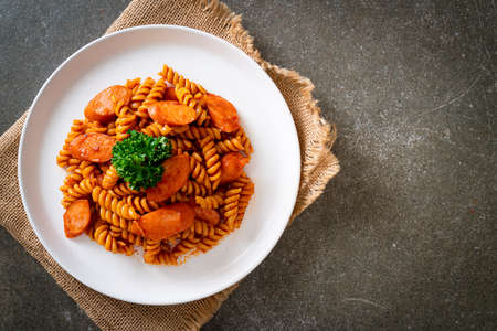 spiral or spirali pasta with tomato sauce and sausage - Italian food styleの写真素材