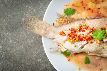Steamed grouper fish with lime and chillies - Asian food styleの写真素材