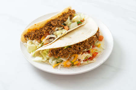 Mexican tacos with minced chicken - Mexican traditional cuisineの写真素材