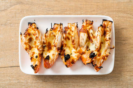 grilled river prawns or shrimps with cheese - seafood styleの写真素材