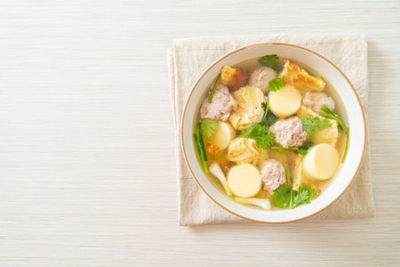 fried egg soup or omelet soup with minced porkの写真素材