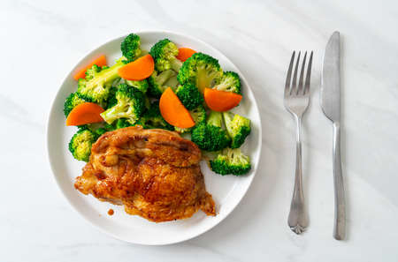 teriyaki chicken steak with broccoli and carrotの写真素材