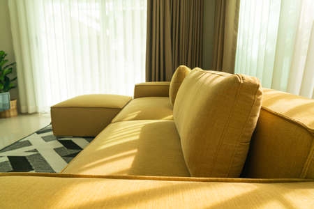 empty golden mustard sofa in living room