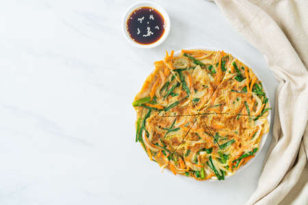Pajeon or Korean pancake or Korean pizza - Asian food styleの写真素材