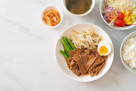 stir-fry Teriyaki Pork with sesame seeds ,mung bean sprouts, boiled egg and rice set - Japanese food styleの写真素材
