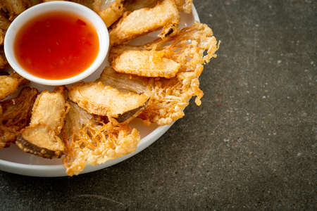 deep fried Enoki mushroom and King Oyster mushroom with spicy dipping sauce - vegan food styleの写真素材