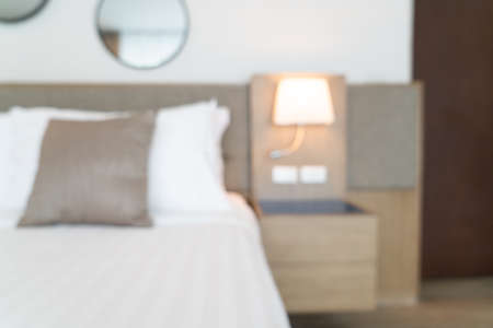 Abstract blur beautiful luxury hotel bedroom interior for backgroundの写真素材
