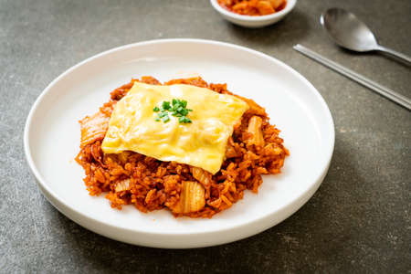 kimchi fried rice with pork and topped cheese - Asian and fusion food styleの写真素材