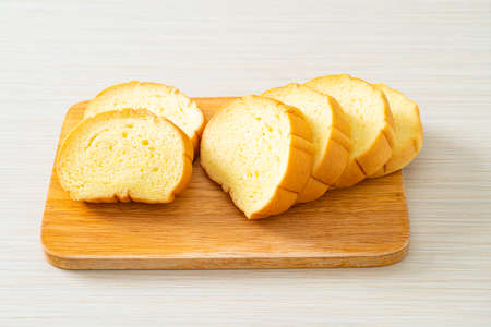 sweet potatoes bread sliced on wood boardの写真素材