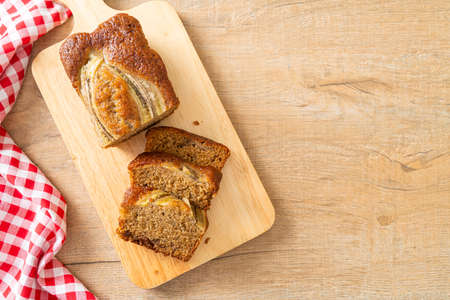 banana cake sliced on wood boardの写真素材