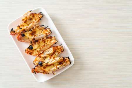 grilled river prawns or shrimps with cheese - seafood styleの写真素材