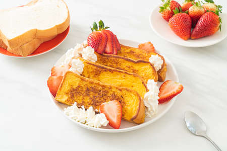 homemade french toast with fresh strawberry and whipping cream