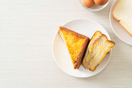 homemade sandwich ham cheese on white plateの写真素材